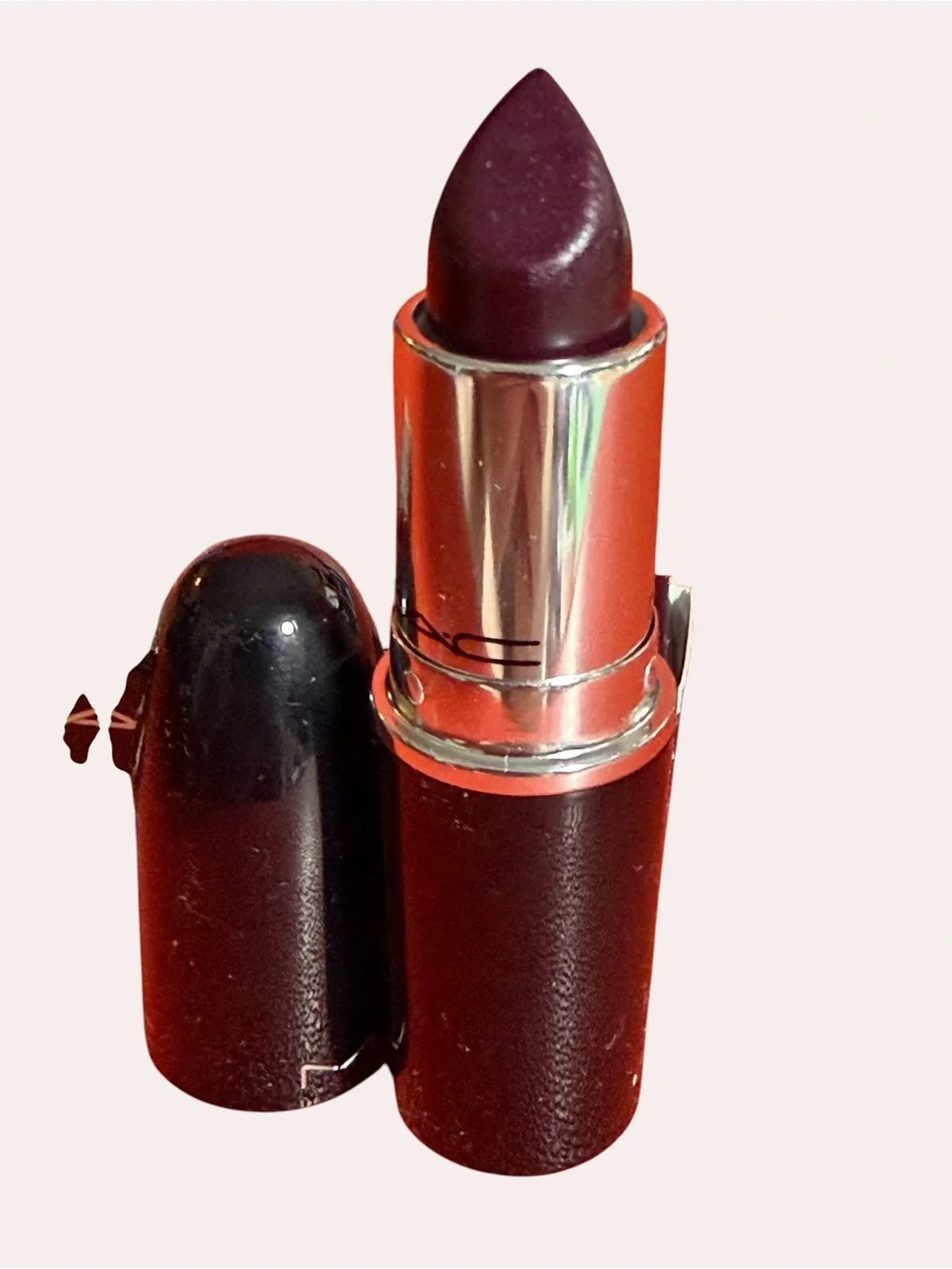 MAC Lustreglass Lipstick in shade, SUCCUMB TO PLUM Deep Plum